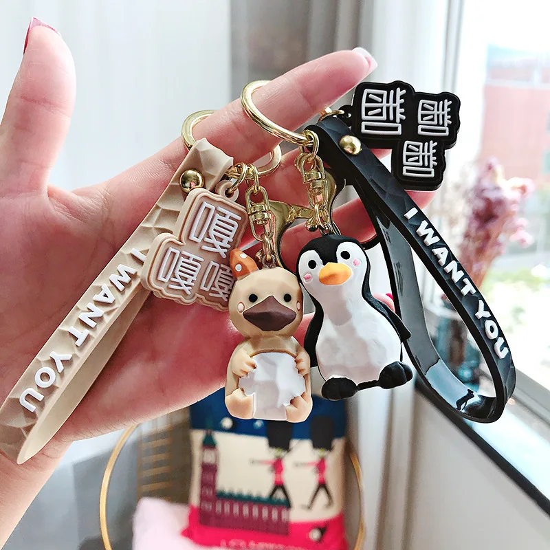 

2019 New Creative Cute Cartoon Little Penguin Doll Car Keychain Creative Male and Female bag Key Chain Ring Pendant Keychain