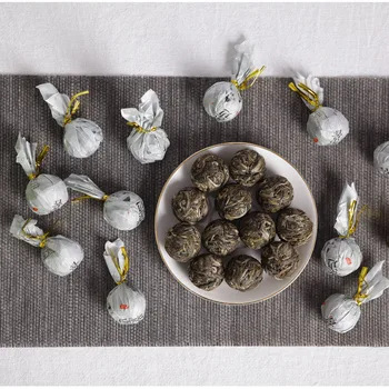 

Wholesale Yunnan Pu'er Tea in Early Spring 2019 Jingmai Dragon Ball Arbor Raw Tea Bulk Factory Direct Sales