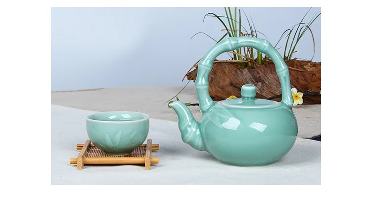 Empty Mountain Xinyu Longquan Celadon Sail Loop-handled Teapot a Pot of Four Cup Kung Fu Tea Set Ceramic Tea Utensil Wholesale