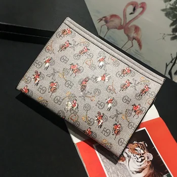 

Tidog New Korean Printed Bag Handbag IPAD clutch bag