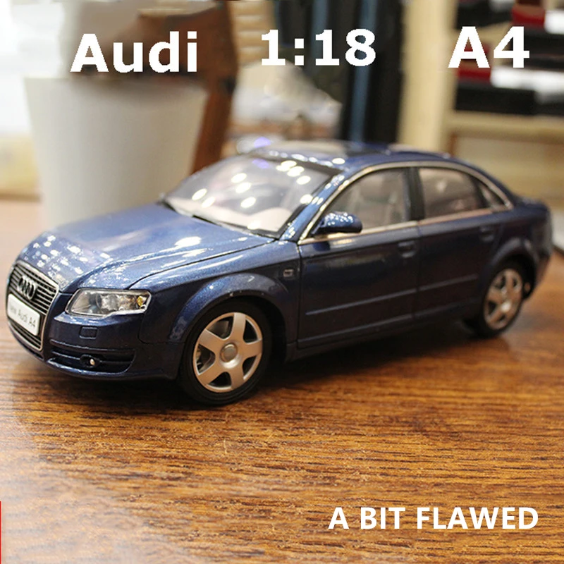 Автомобиль игрушечный Audi A4 1:18 модели audi 4 с открывающимися дверцами