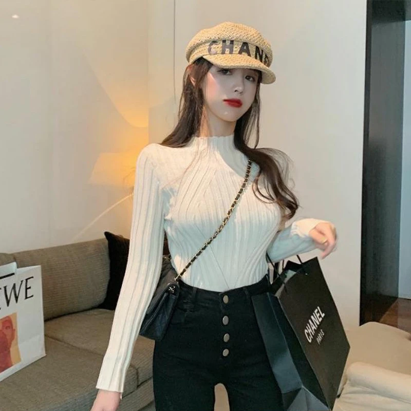

Solid color autumn and winter new long-sleeved lazy wind sweater women's bottoming is thin and versatile and loose. Wear sweater