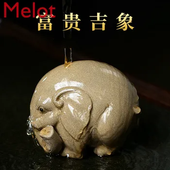 

Yixing famous purple sand tea favorite small ornaments can raise auspicious elephant tea table pure handmade personality