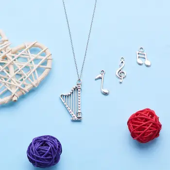 

1 Box Tibetan Style Alloy Pendants Musical Instruments Antique Silver 90pcs/set