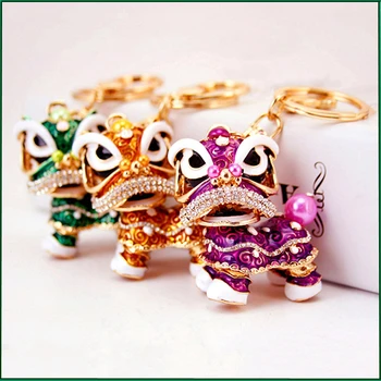 

Lucky Gift For Wedding Chinese Festival Rotatable Crystal Lion Dance Keychain Lucky Mascot New Year Gift