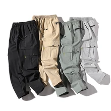Мужские однотонные брюки для бега, мужские брюки-карго с большими карманами, повседневные уличные свободные укороченные брюки большого размера