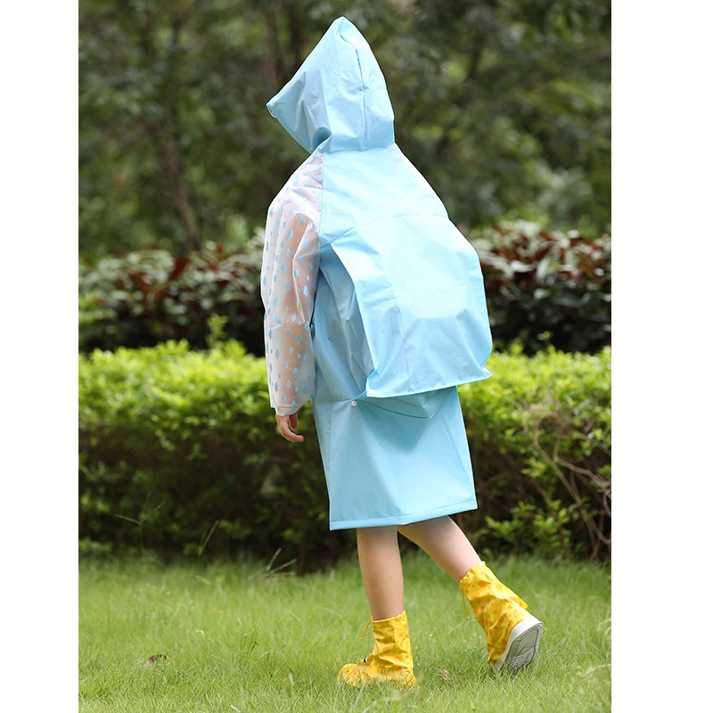 Cute child raincoat kindergarten elementary school student with schoolbag bit hiking raincoat