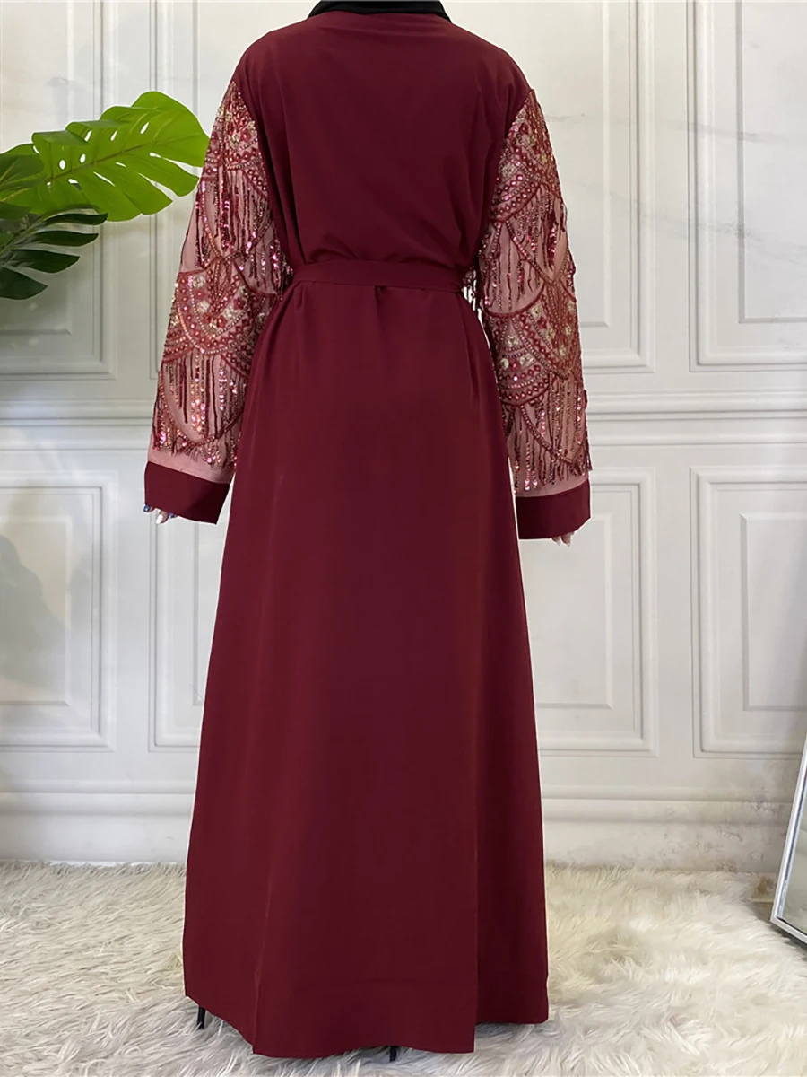 CHAOMENG MUSLIM SHOP1788#Middle East Fashion Tassels Sequins Dubai AbayaChaomeng StoreCHAOMENG MUSLIM SHOP1788#Middle East Fashion Tassels Sequins Dubai Abaya - CHAOMENG MUSLIM SHOPBrand Name:None Department Name:Adult Origin:CN(Origin) Fabric Type:Woven Material:Polyester Decoration:Tassel Style:Fashion Item Type:ABAYA Model Number:CM1788 More Colors Lined Dress Show All-match Muslim Abaya, Have many colors, You can match abaya in different colors, This is 100% cotton fabric. This quality is very good, You deserve it, If you want to own this dress,you can click on the picture to own this dress. Size Chart : 1 inch = 2.54 cm S: Bust 102 cm,Sleeve 60 cm,Length 133 cm M: Bust 107 cm,Sleeve 60 cm,Length 138 cm L: Bust 112 cm,Sleeve 60 cm,Length 143 cm XL: Bust 117 cm,Sleeve 60 cm,Length 148 cm 2XL: Bust 122 cm,Sleeve 60 cm,Length 153 cm Model show - CHAOMENG MUSLIM SHOP1788#Middle East Fashion Tassels Sequins Dubai AbayaBrand Name:None Department Name:Adult Origin:CN(Origin) Fabric Type:Woven Material:Polyester Decoration:Tassel Style:Fashion Item Type:ABAYA Model Number:CM1788 More Colors Lined Dress Show All-match Muslim Abaya, Have many colors, You can match abaya in different colors, This is 100% cotton fabric. This quality is very good, You deserve it, If you want to own this dress,you can click on the picture to own this dress. Size Chart : 1 inch = 2.54 cm S: Bust 102 cm,Sleeve 60 cm,Length 133 cm M: Bust 107 cm,Sleeve 60 cm,Length 138 cm L: Bust 112 cm,Sleeve 60 cm,Length 143 cm XL: Bust 117 cm,Sleeve 60 cm,Length 148 cm 2XL: Bust 122 cm,Sleeve 60 cm,Length 153 cm Model show29.9Chaomeng Store