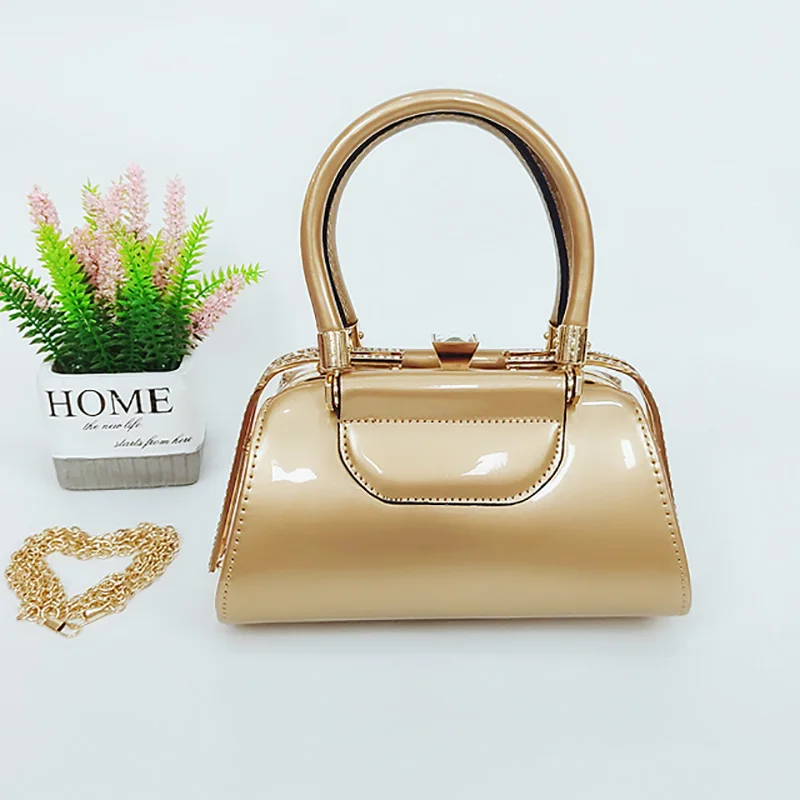 

2021 Metal wrist fashion handbag for women gold evening bag PU leather shoulder bag