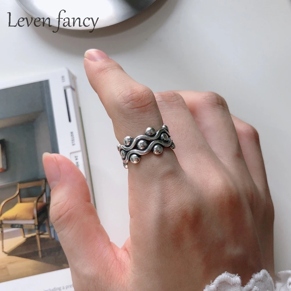 

Leven Fancy / Retro 925 Sterling Silver Flowing Water Wave Ring Wedding Cocktail Bijoux Open Adjust Ring for Womens Punk Design