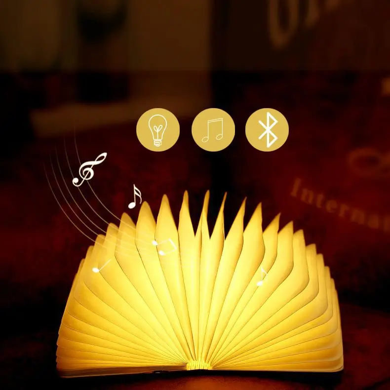 

Manufacturers Direct Selling LED Wood BoY Lamp Customizable Logo USB Rechargeable Bluetooth Loudspeaker Box Folding Flip Book Li