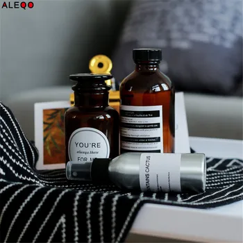 

Scandinavian Chic Glass Storage Jar with Sticker Nordic Modern Minimalist Desk Storage Bottle Organizer Flower Container Decor