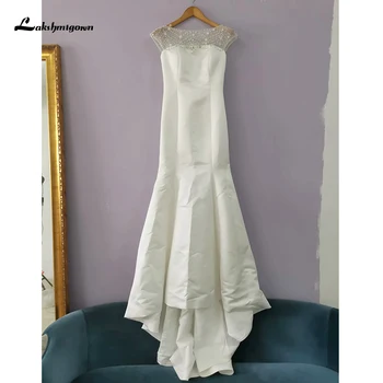 

In Stock Ivory Sexy Sheer Back Mermaid Wedding Dresses with beads Court Train Bridal Gowns Elegant Beading Pearls Sequins Spring