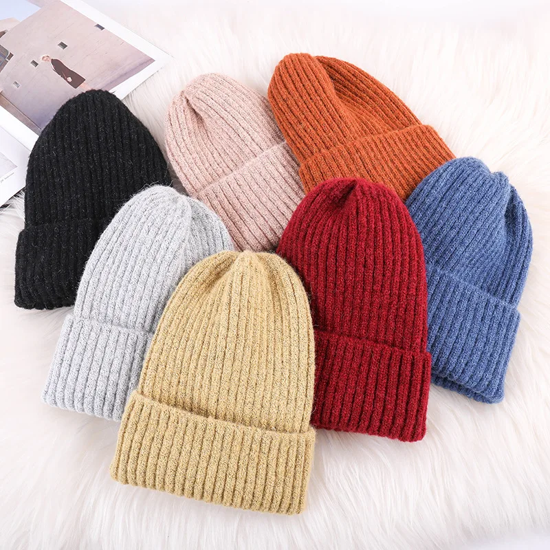 

Winter new cap ladies Korean version curling bell knitted cap candy color warm wool cap beanies