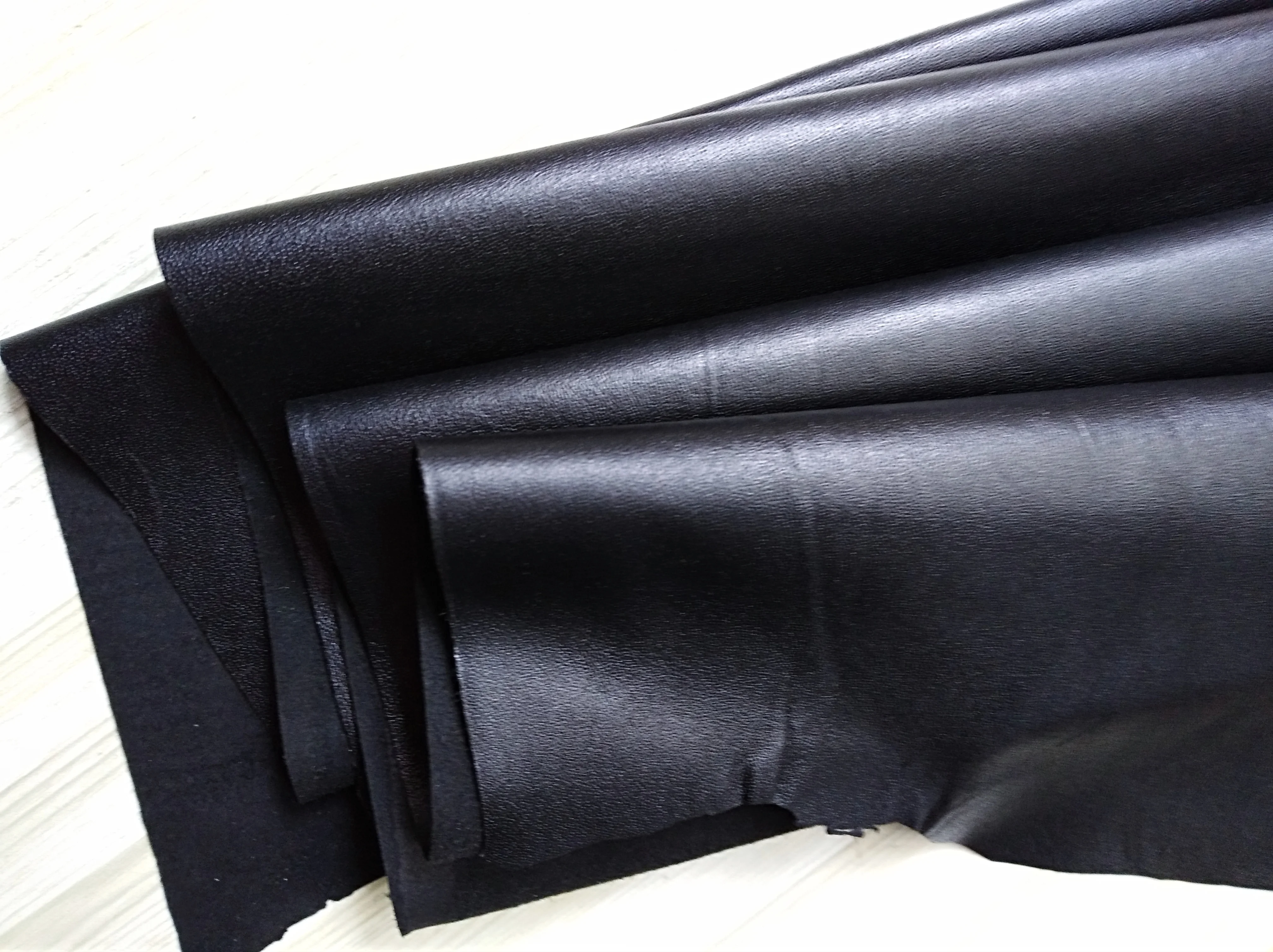 

Plain blackpattern handmade sheepskin leather fabric 1.1-1.5mm soft clothing sewing home daily necessities bag material