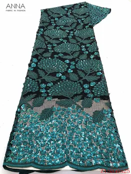 

Anna green embroidered lace fabric 2020 high quality french hollow design of coarse mesh laces fabrics with sequins for dresses
