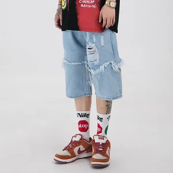 

High Street Hole Frayed Jeans Shorts Men and Women Loose Straight Tassel Denim Shorts Harajuku Hip Hop Five-point Pants