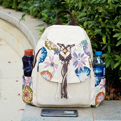 Fashion national string appliques women shopping backpacks!Nice floral embossing lady hasp backrack All-match Canvas backruck
