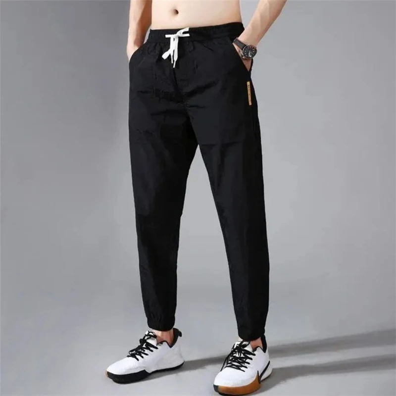 2021 Summer Men Pants Sports Outdoor Casual Trousers Solid Color Elastic Waist Lightweight Comfortable Male Long Pants Plus Size cotton harem pants