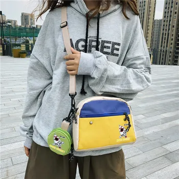 

Messenger Bag female canvas large capacity student fashion color contrast Hong Kong style shoulder bag