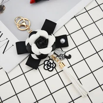 

Fashion PU Tassel Keychain Bow Elegant Leather Camellia Rose Flower Pearl Pendant Women Car Bag Key Ring Decoration Holiday Gift