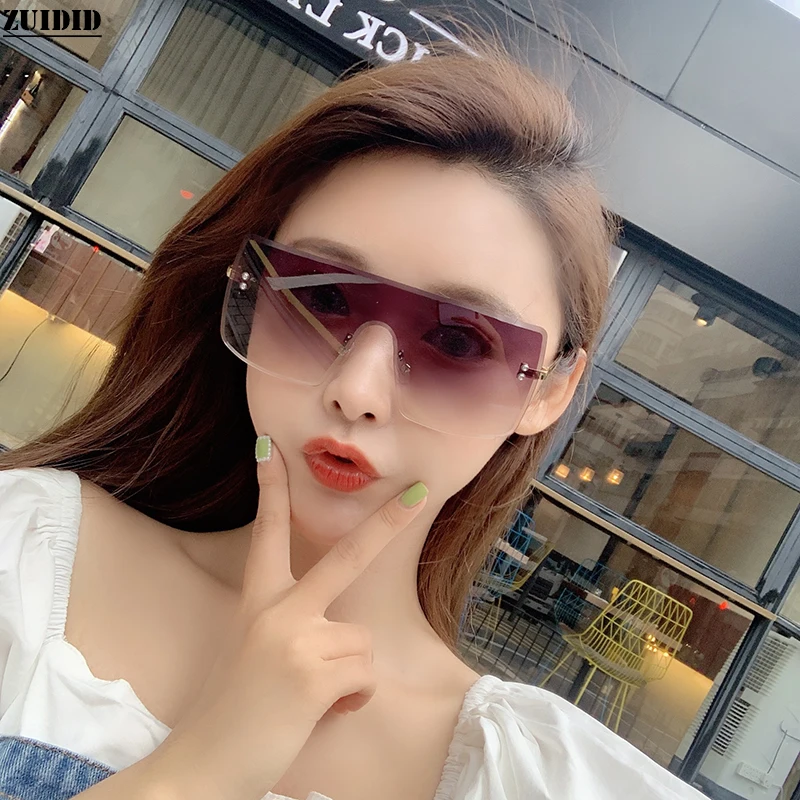 

NEW style large square rimless sunglasses women integrated sunglasses fashion trend classic personality decorative glasses women
