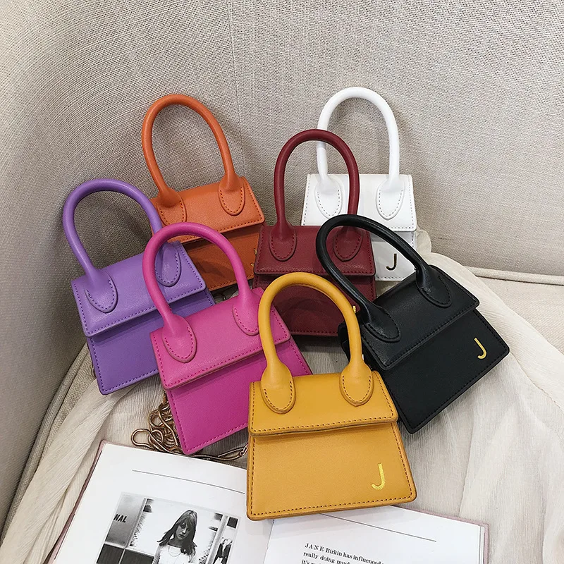 

2019 new three-dimensional candy ladder small square bag ear shoulder slant woman's bag shoulder shoulder.