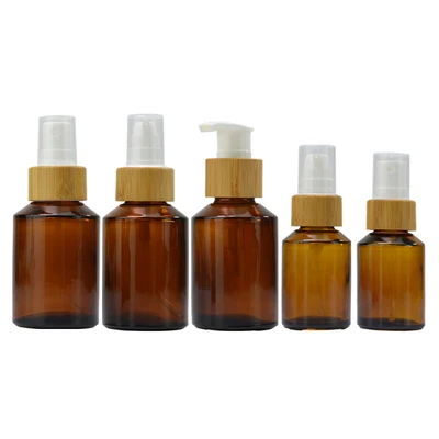 

Эко-дружественных 2oz бамбуковой крышкой многоразовый Янтарный Отель дозатор жидкого мыла для мытья рук ликерная бутылочная насос эфирное масло стеклянная бутылка