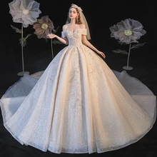 

Custom Made Shining Luxury A Line Wedding Dresses Satin Beading Crystals Boat Neck Floor Length Bridal Gown Chapel Train Corset