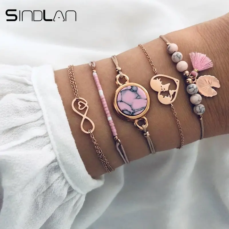 

Sindlan 5PCs Vintage Pink Natural Stone Charm Tassel Bracelets for Women Infinity Map Heart Rhinestone Boho Bracelets Set