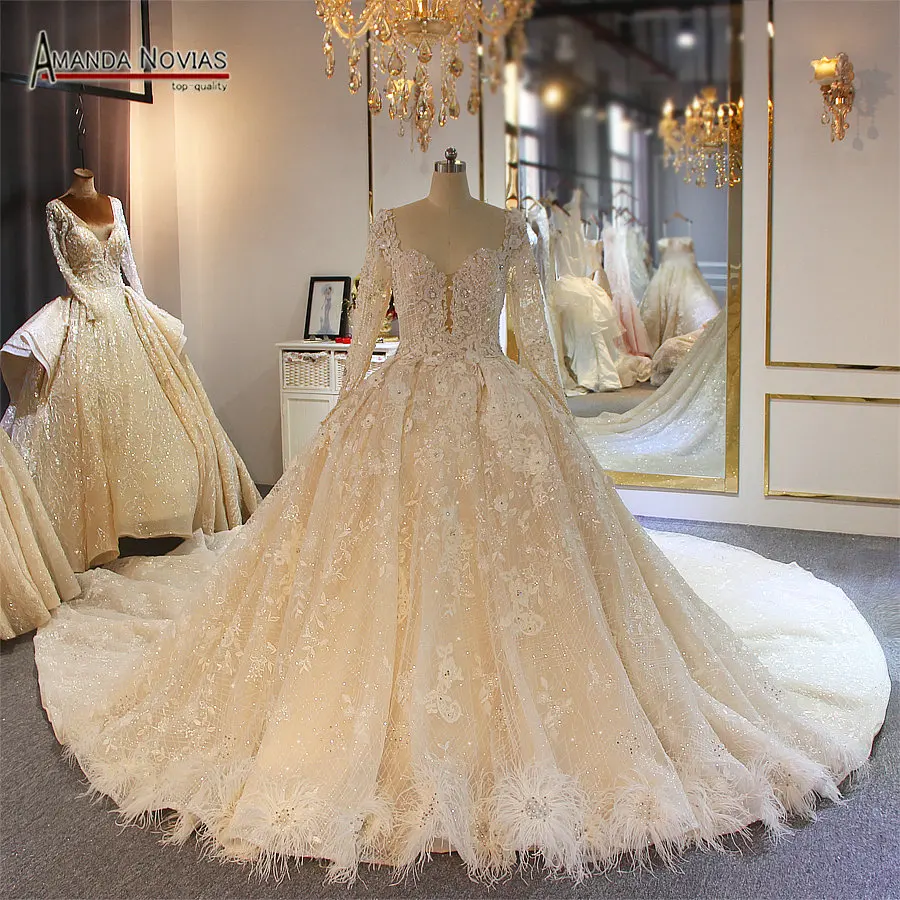 

Long sleeves lace plus size wedding dress real work photo