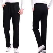 

60%HOTCalças esportivas masculinas de bolso soltas novas de cor sólida para o verão, calças casuais masculinas, adequadas para o