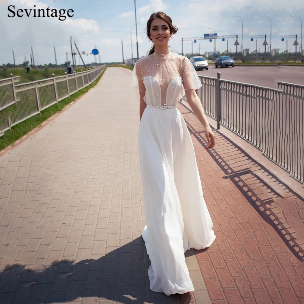 

Sevintage Beach High Neck Boho Wedding Dresses Short Sleeve Pearls Bridal Gowns with Sashes Buttons Back Vestido De Noiva 2020