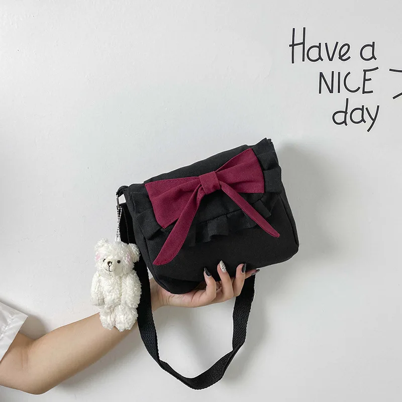 

Literary and Art Small Fresh Bowknot Art Canvas Shoulder Bag Student Wild Casual Style Literary Sweet Style Satchel Handbag