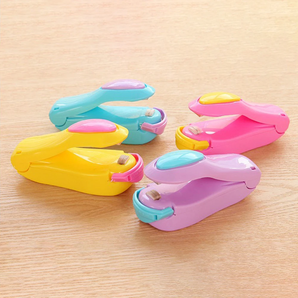 

Cute Candy Color Portable Mini Sealing Machine Snack Plastic Bag Sealing Machine Home Hand Pressure Sealing Machine 10x4x5cm