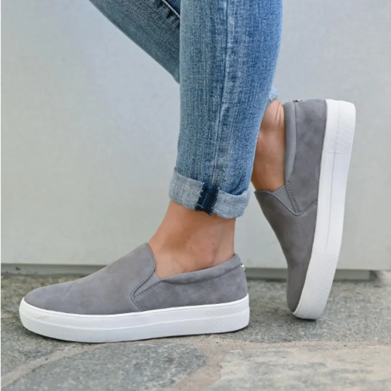 flats with teal soles