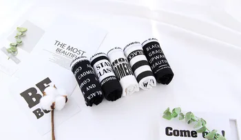 

56/5000 Black and white tide Fan underwear female cotton cotton middle waist lady cotton triangular bottom trousers all cotton