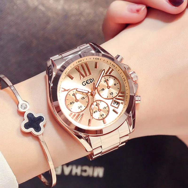 Preise GIMTO Marke Luxus Rose Gold Frauen Uhr Wasserdicht Kalender Einzigartige Quarz Business Kleid Uhren für Weibliche Golden Lady Uhr