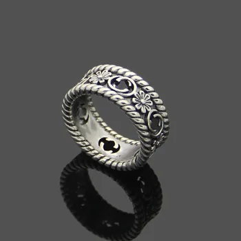 

Jewelry wholesale hollow letter small flower ring wide version narrow version lovers carved flower ring