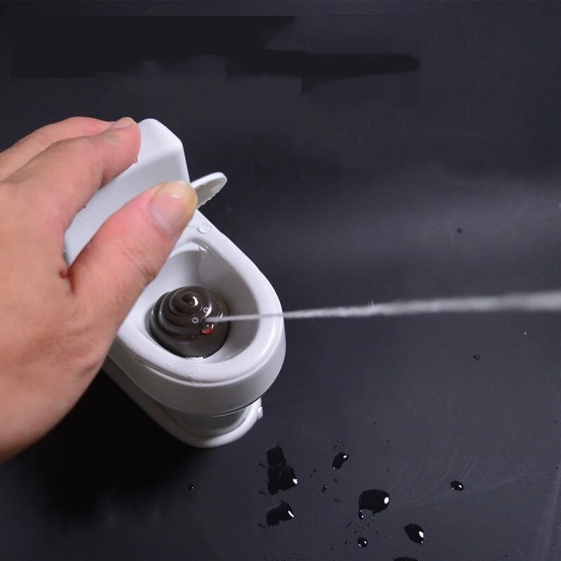 

Funny Poop Spray Prank Toy White Mini Sprinkler Toilet Toy for Kids