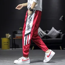 Модные брендовые красные лоскутные брюки с надписями; большие размеры; мужские однотонные спортивные штаны высокого качества с карманами; повседневные свободные штаны для мужчин; популярные штаны в стиле хип