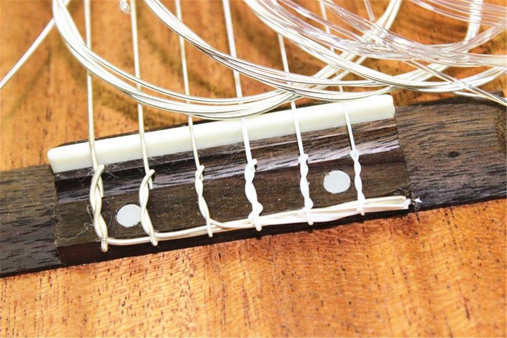 нейлоновые струны на классическую гитару bellucci bc3820. чем отличаются струны. цветные струны для акустической гитары. чем отличаются струны. нейлоновые струны dcv100nb.