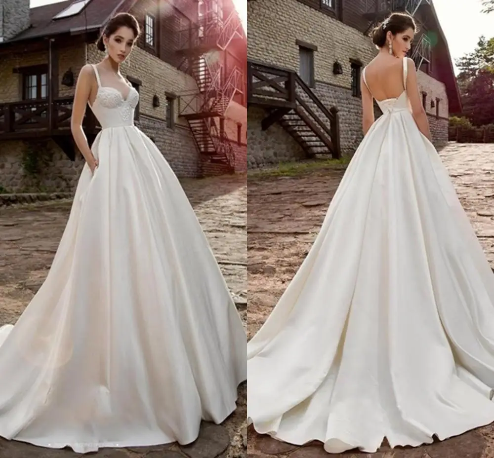 

2020 A Line Satin Beach Wedding Dresses Spaghetti Sweep Train Backless Lace Appliques Simple Country Bridal Gowns Custom Made