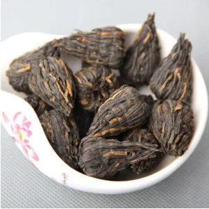 

The Top Grade Yunnan handmade blooming tea Red Yunnan Cha Tou Black Tea Dianhong tea Pagoda Perfume And Foam Jin Junmei tea