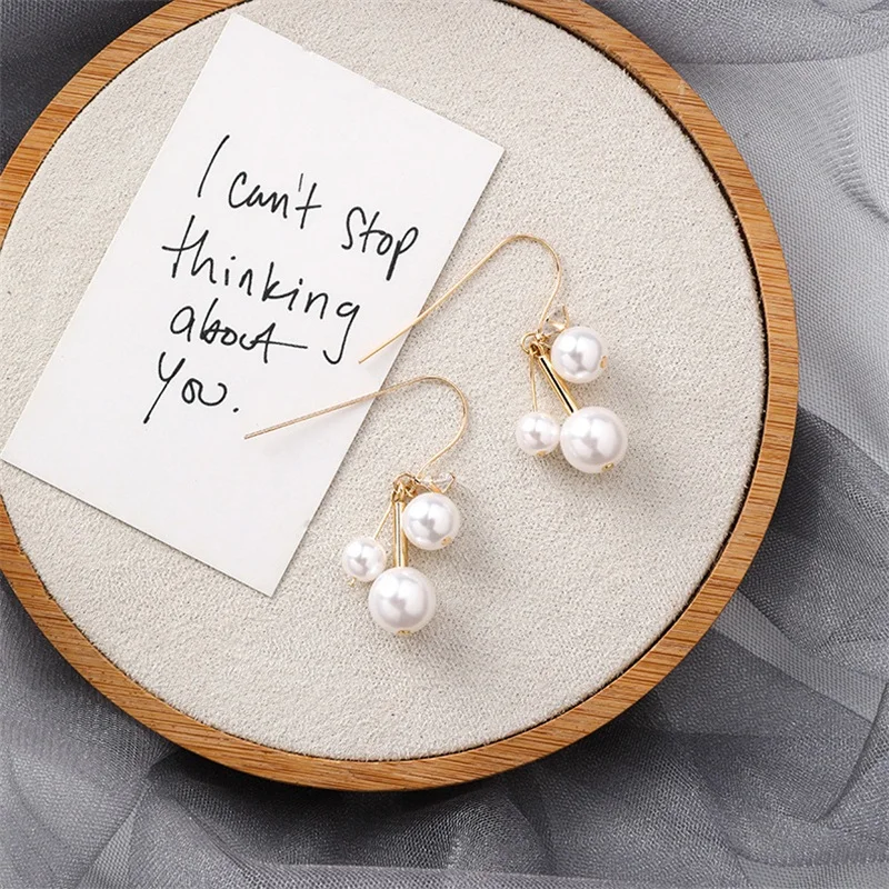 

Korea Fashion Retro Pearl Short Pendant Ear Hook Earrings Trend Simple Simple Wild Temperament Sweet Female Earring Jewelry Gift