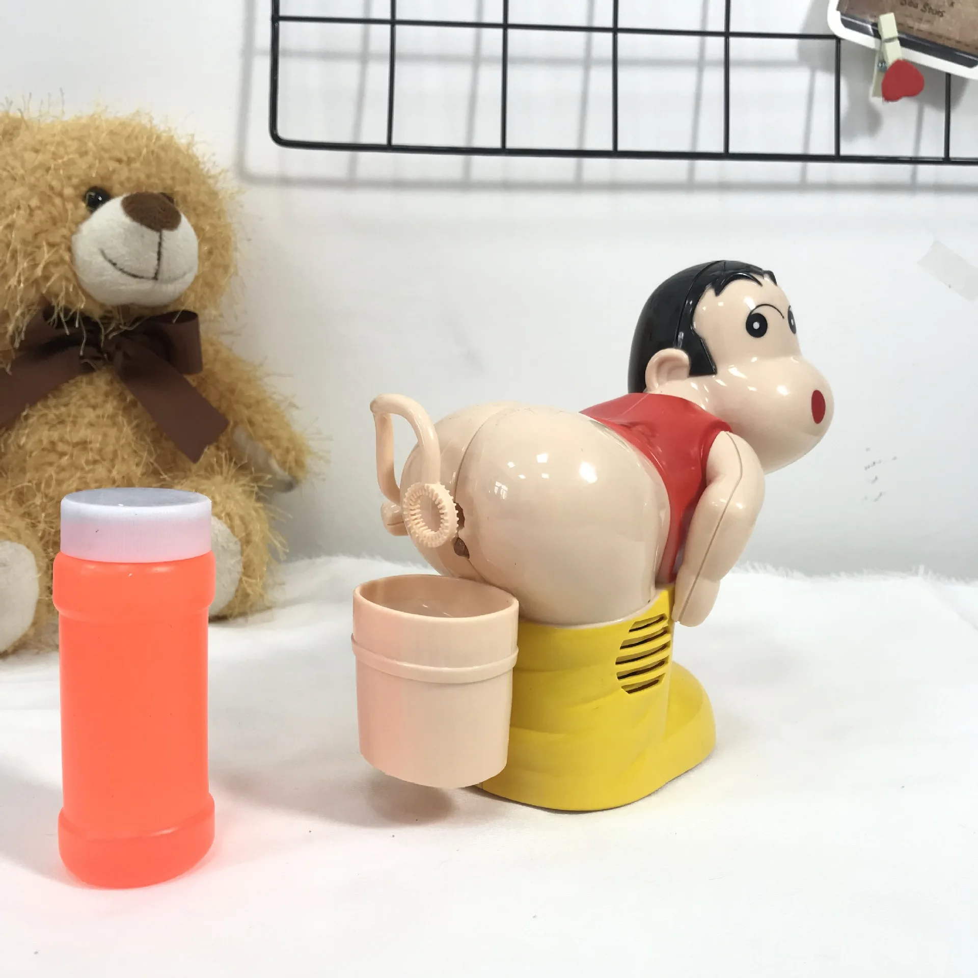 Электрические выдувные пузырьки веселый мальчик Дуя пузыри Shinchan Дуя пузыри Электрический музыкальный пузырьковый аппарат