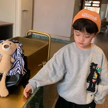 

Children's clothing boys printed sweater 2021 new children's abstract heat transfer sweater