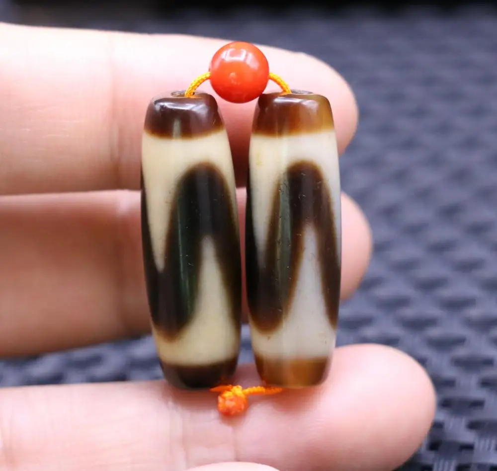 

pair Magic Energy Tibetan Old Agate Ivory Color Tiger-tooth dZi Bead Amulet 34mm Pendant