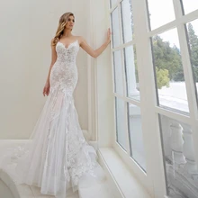 Wspaniała suknia ślubna syrenka 2021 paski Spaghetti Backless koronkowe aplikacje tiul Sweep pociąg suknia ślubna Vestidos De Noiva