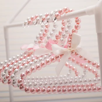 

1pcs 20cm Children Pearl Hanger Dog Hangers for Clothes Pegs Baby Pearl Plastic Pet Hangers Coat Hangers